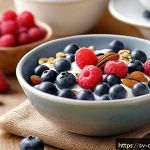 Home 22 식재료 활용으로 만드는 특별한 아침 메뉴 - A cozy breakfast scene featuring a rustic wooden table set with a creamy bowl of natural yogurt topp...